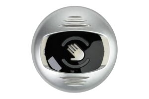 לחצן ללא מגע עגול COPA, מבט חזית: גוף כסוף וחלון חישה שחור עם סמל יד, דגם 12812